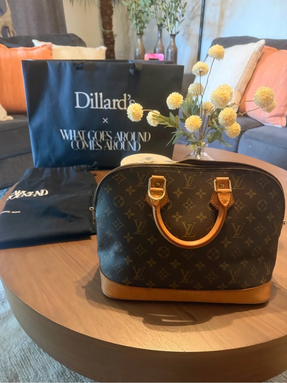Louis Vuitton Monogram Alma Satchel in Brown and Tan Leather Trim